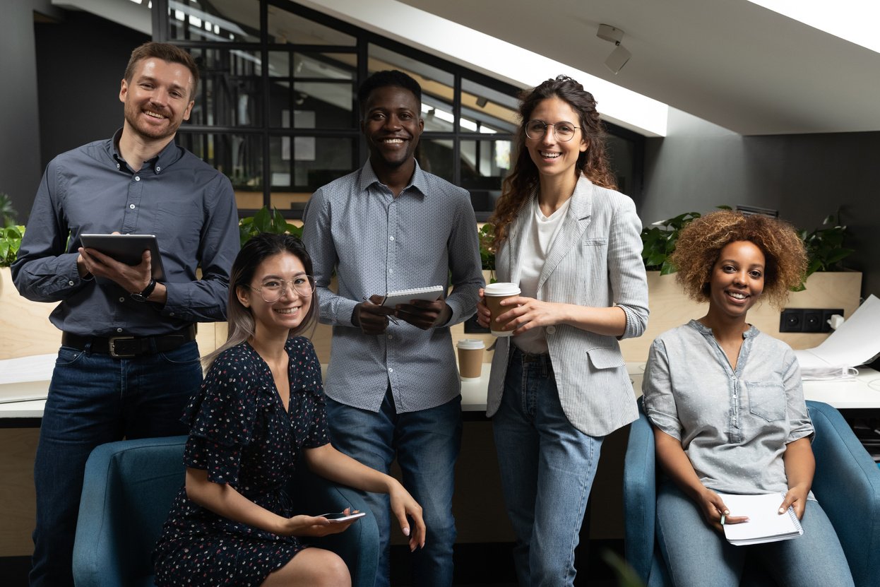 Happy diverse international company staff business people team portrait